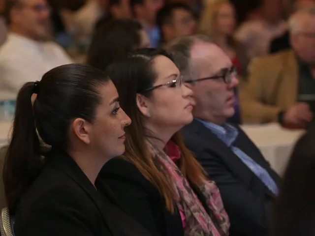 The audience listening to a talk