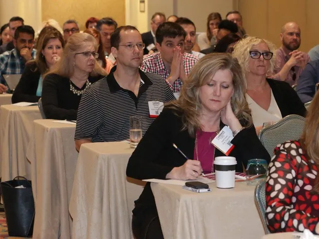 Attendees taking notes