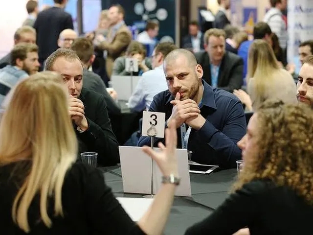 Practitioners talking at a roundtable