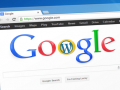 The Google homepage with Google logo, modified so that the WordPress W appears in the second O.